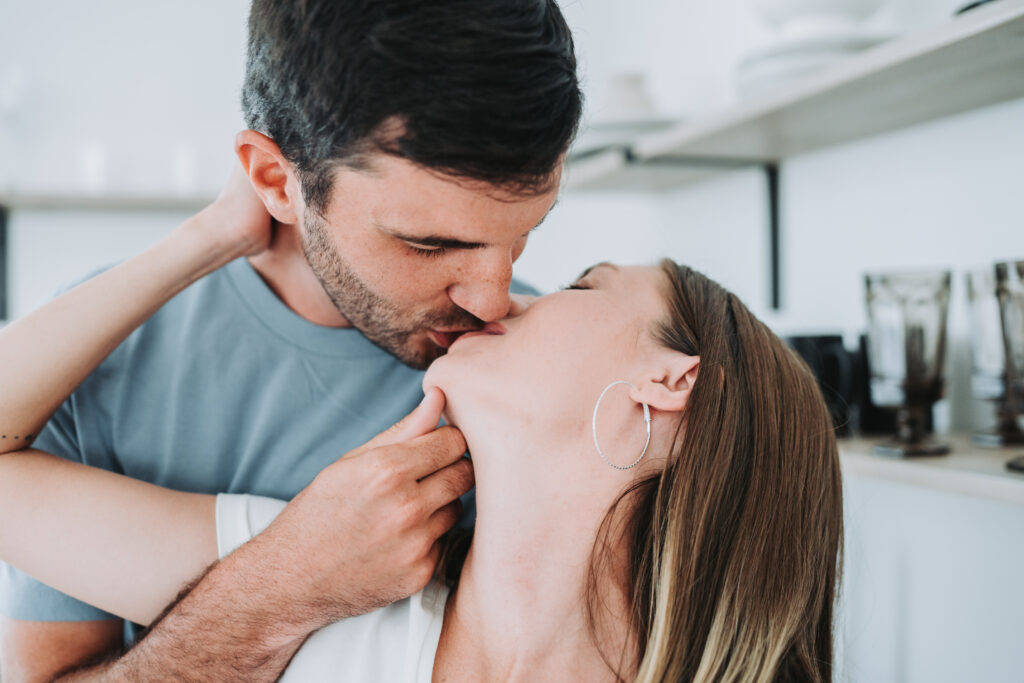 Couple kissing photographed by atlanta wedding photographer