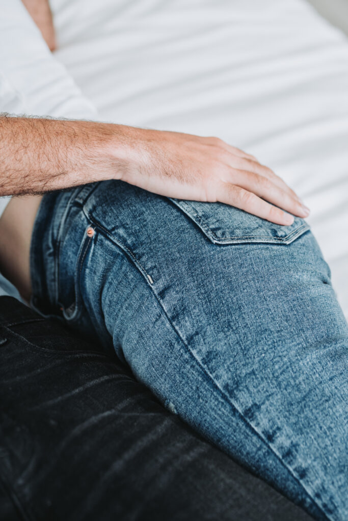 husbands hand on wife's bottom