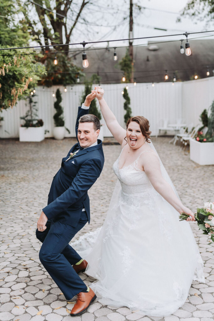 Bride and Groom drop it like it's hot. Wedding at Brick and Ivey, Atlanta, GA.