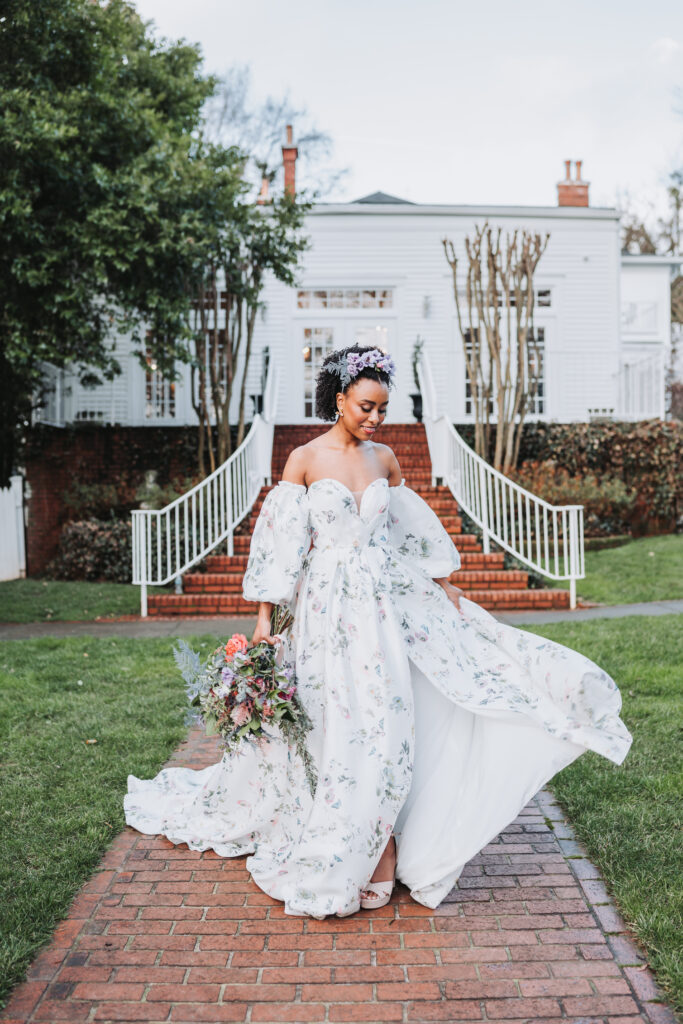 Bride plays with dress during a Winter Wedding at Whitlock Inn