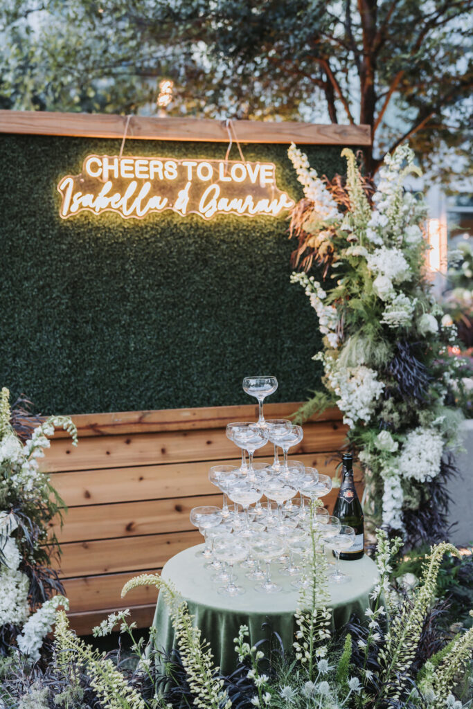 Champagne tower and florals at Epicurean hotel wedding.