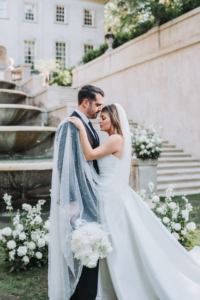 Bride and Groom face each other at their ceremony space at the Swan House in Atlanta, Ga.