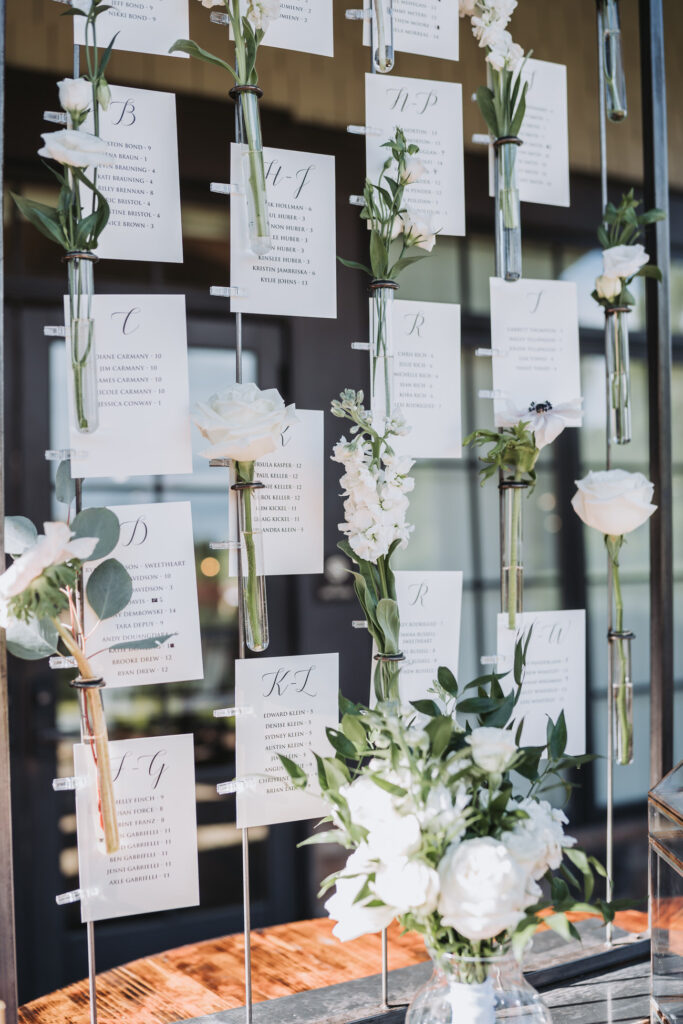 hanging seating placements decoration with flowers at cocktail hour