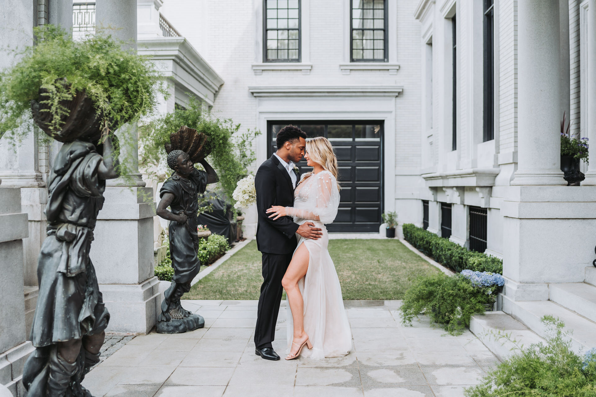 Bride and Groom touch foreheads at Armstrong Kessler Wedding Venue in Savannah Georgia