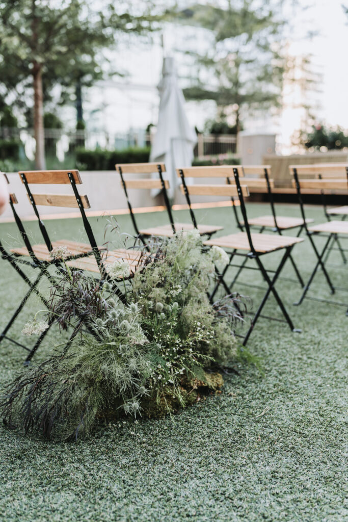wedding ceremony details lush greenery