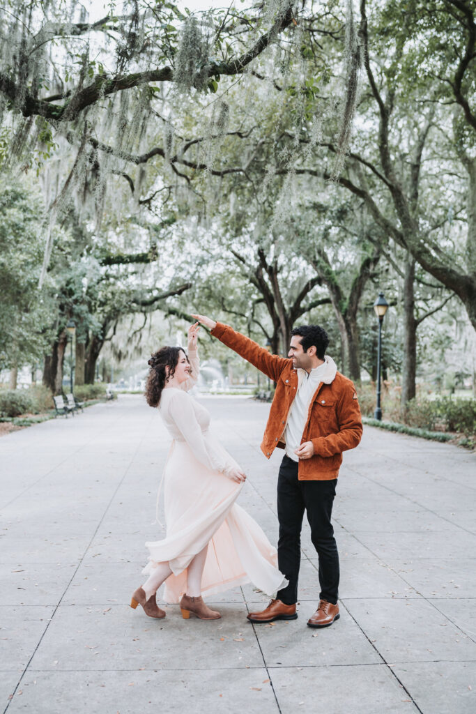 Groom spins bride at Forsyth Park