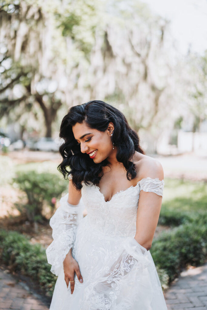 Bride poses for camera at savannah wedding