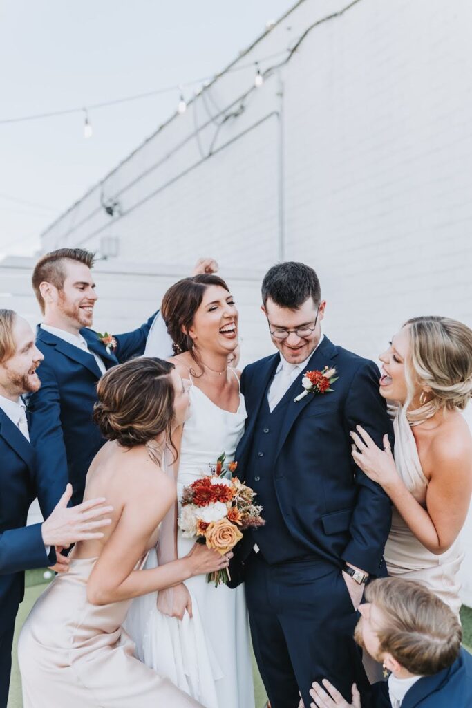 Bride and groom with their bridesmaids