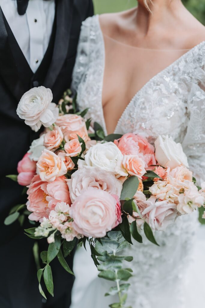 Bride holding wedding flower bouquet