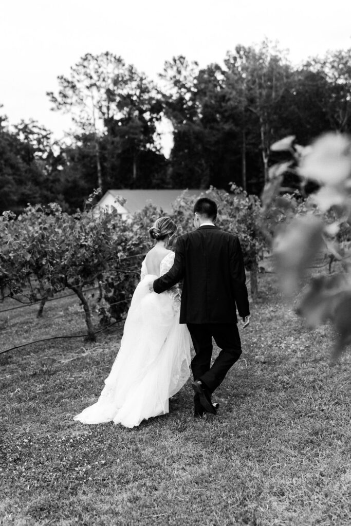 Couple walking outside wedding venue