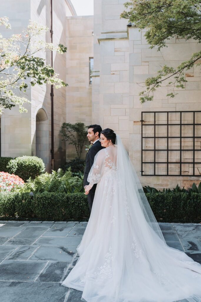 a couple being photographed at their wedding