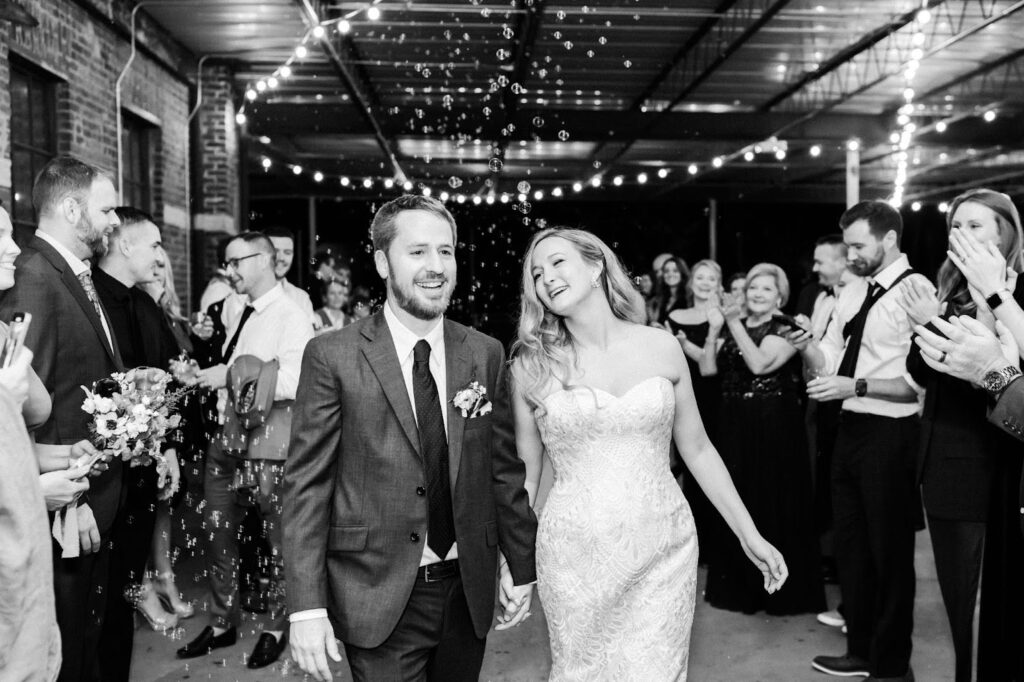 Bride and groom bubble exit