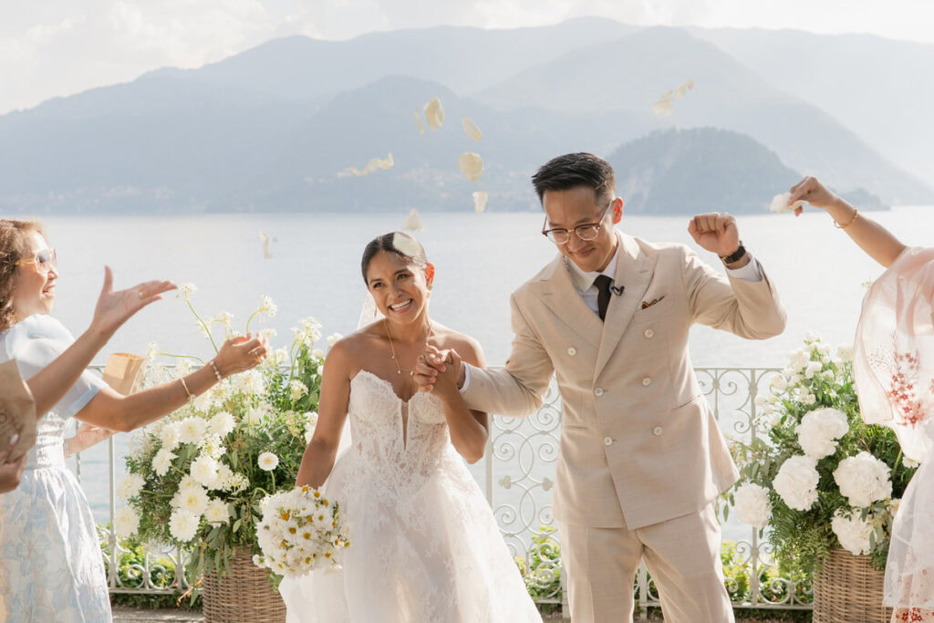 Bride and groom walking down aisle of their Destination wedding ceremony in Italy