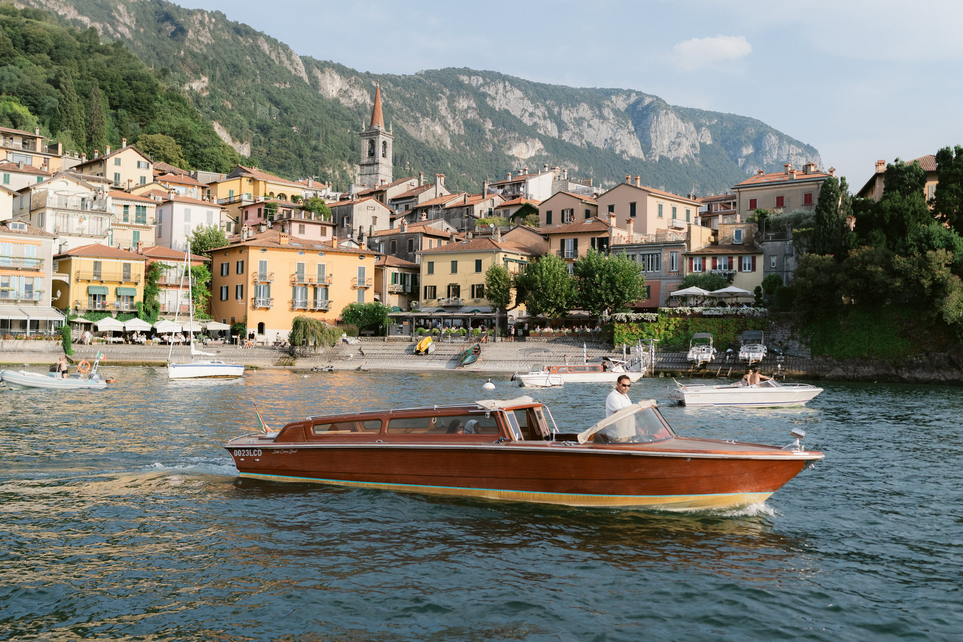 Boat crossing on water in lake como
